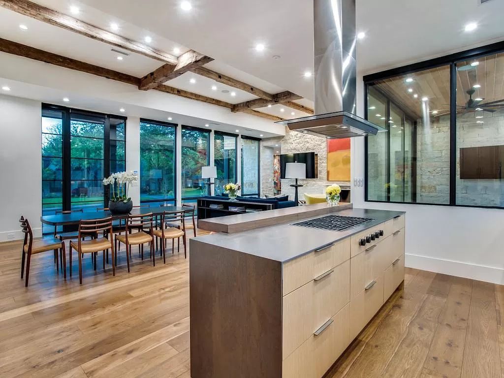 The Home in Dallas is a modern masterpiece features high-end luxury design and custom details including custom dry stacked stone, custom metal gutters, metal roof now available for sale. This home located at 5736 Stonegate Rd, Dallas, Texas
