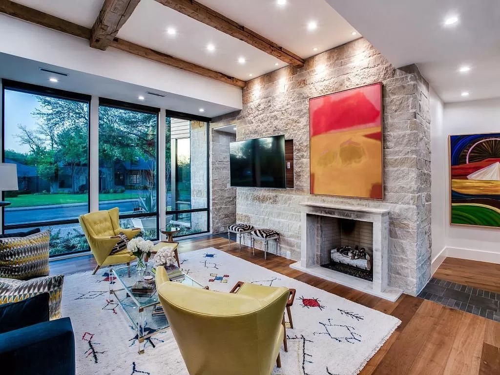 The Home in Dallas is a modern masterpiece features high-end luxury design and custom details including custom dry stacked stone, custom metal gutters, metal roof now available for sale. This home located at 5736 Stonegate Rd, Dallas, Texas