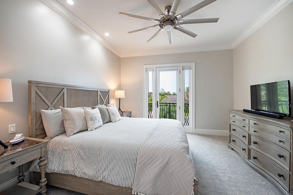 The Naples Home offers a perfect union between classically elegant architecture and contemporary finishes now available for sale. This home located at 13124 White Violet Dr, Naples, Florida