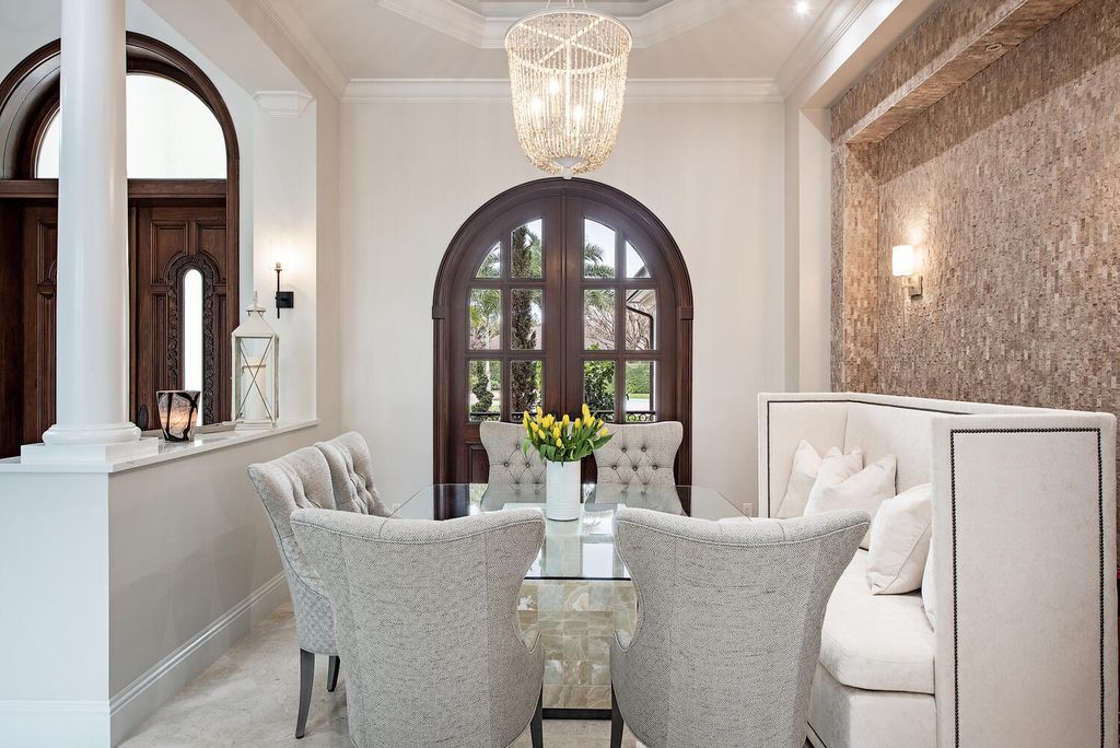 The Naples Home offers a perfect union between classically elegant architecture and contemporary finishes now available for sale. This home located at 13124 White Violet Dr, Naples, Florida