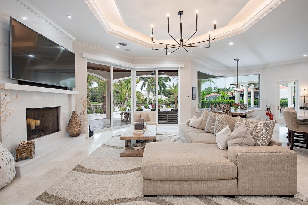The Naples Home offers a perfect union between classically elegant architecture and contemporary finishes now available for sale. This home located at 13124 White Violet Dr, Naples, Florida