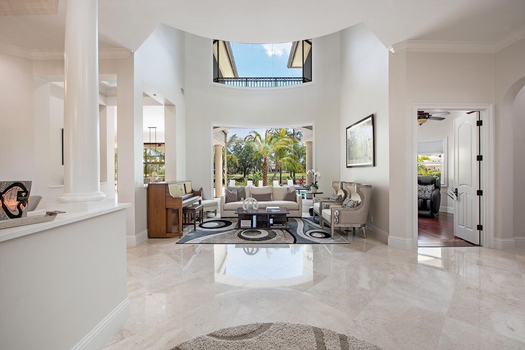 The Naples Home offers a perfect union between classically elegant architecture and contemporary finishes now available for sale. This home located at 13124 White Violet Dr, Naples, Florida