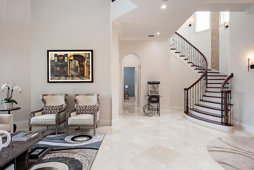 The Naples Home offers a perfect union between classically elegant architecture and contemporary finishes now available for sale. This home located at 13124 White Violet Dr, Naples, Florida