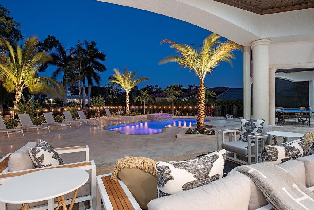 The Naples Home offers a perfect union between classically elegant architecture and contemporary finishes now available for sale. This home located at 13124 White Violet Dr, Naples, Florida
