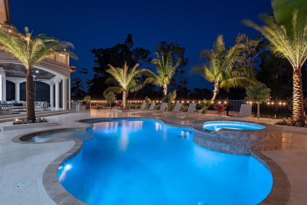The Naples Home offers a perfect union between classically elegant architecture and contemporary finishes now available for sale. This home located at 13124 White Violet Dr, Naples, Florida