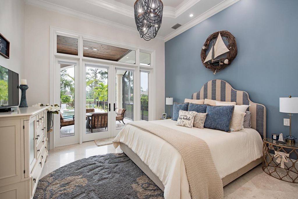 The Naples Home offers a perfect union between classically elegant architecture and contemporary finishes now available for sale. This home located at 13124 White Violet Dr, Naples, Florida