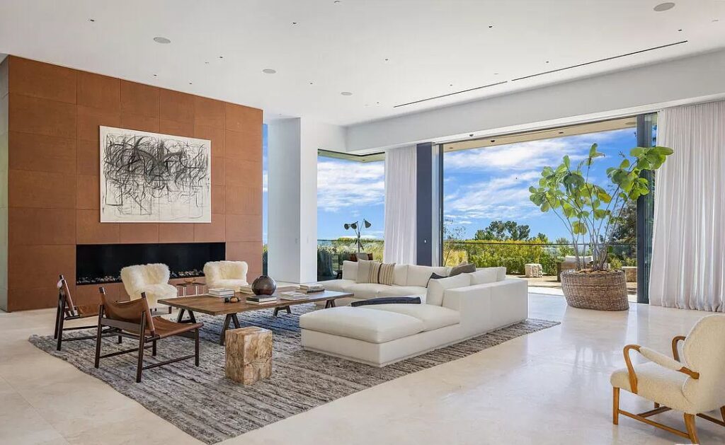 The Bel Air Mansion is a recently completed 15,000 sf contemporary masterpiece with soaring ceilings throughout, state-of-the-art amenities now available for sale. This home located at 755 Sarbonne Rd, Los Angeles, California