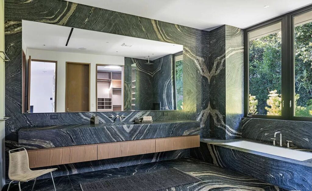 The Bel Air Mansion is a recently completed 15,000 sf contemporary masterpiece with soaring ceilings throughout, state-of-the-art amenities now available for sale. This home located at 755 Sarbonne Rd, Los Angeles, California