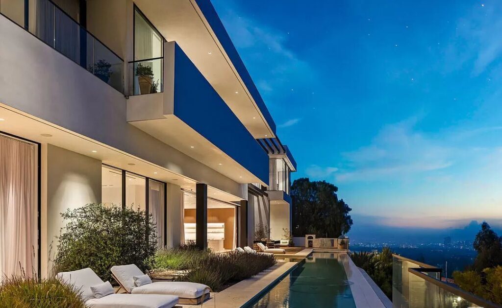 The Bel Air Mansion is a recently completed 15,000 sf contemporary masterpiece with soaring ceilings throughout, state-of-the-art amenities now available for sale. This home located at 755 Sarbonne Rd, Los Angeles, California