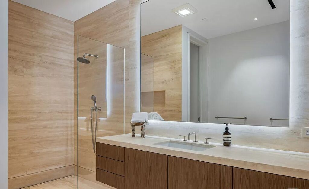 The Bel Air Mansion is a recently completed 15,000 sf contemporary masterpiece with soaring ceilings throughout, state-of-the-art amenities now available for sale. This home located at 755 Sarbonne Rd, Los Angeles, California