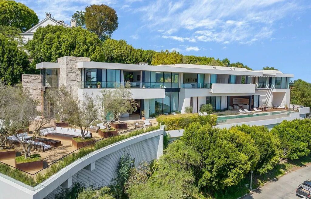 The Bel Air Mansion is a recently completed 15,000 sf contemporary masterpiece with soaring ceilings throughout, state-of-the-art amenities now available for sale. This home located at 755 Sarbonne Rd, Los Angeles, California