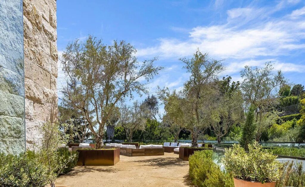 The Bel Air Mansion is a recently completed 15,000 sf contemporary masterpiece with soaring ceilings throughout, state-of-the-art amenities now available for sale. This home located at 755 Sarbonne Rd, Los Angeles, California