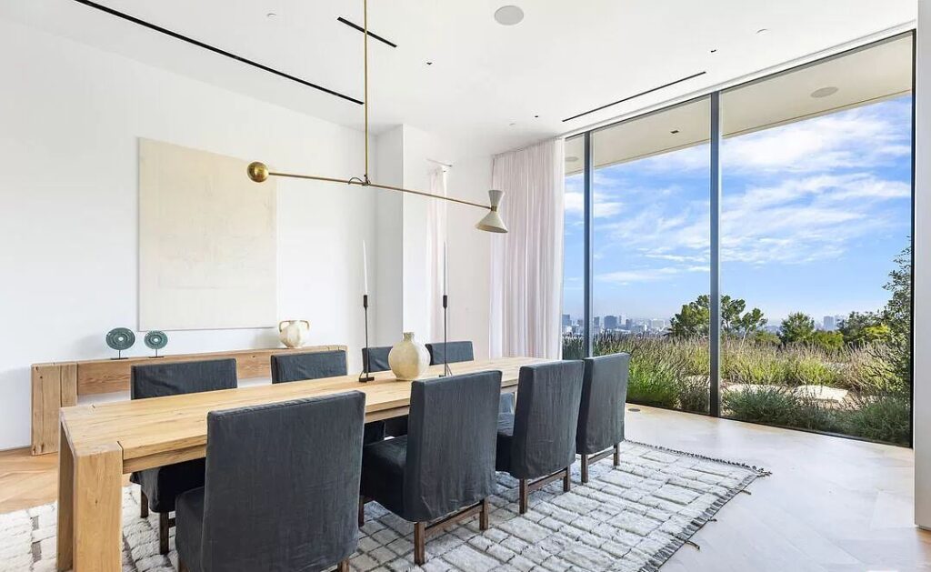 The Bel Air Mansion is a recently completed 15,000 sf contemporary masterpiece with soaring ceilings throughout, state-of-the-art amenities now available for sale. This home located at 755 Sarbonne Rd, Los Angeles, California