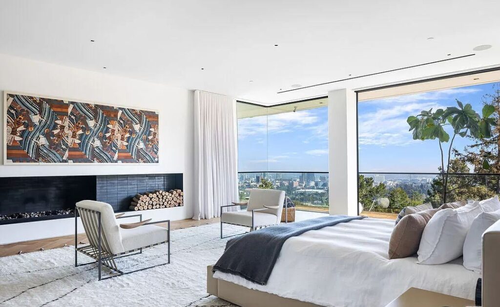 The Bel Air Mansion is a recently completed 15,000 sf contemporary masterpiece with soaring ceilings throughout, state-of-the-art amenities now available for sale. This home located at 755 Sarbonne Rd, Los Angeles, California