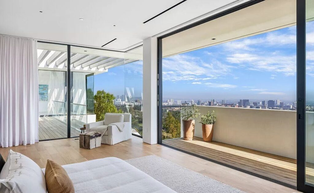 The Bel Air Mansion is a recently completed 15,000 sf contemporary masterpiece with soaring ceilings throughout, state-of-the-art amenities now available for sale. This home located at 755 Sarbonne Rd, Los Angeles, California