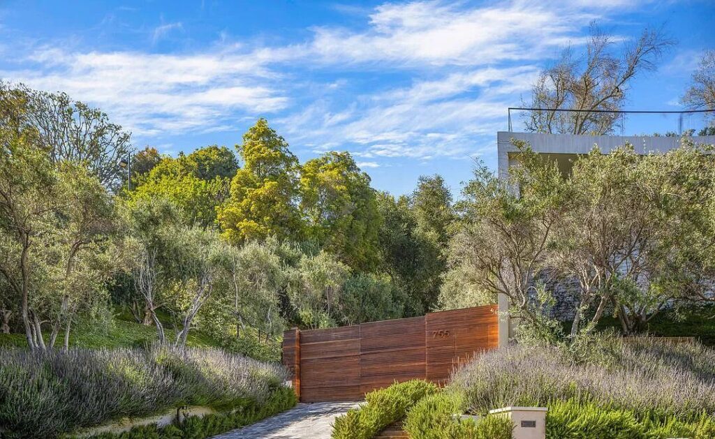 The Bel Air Mansion is a recently completed 15,000 sf contemporary masterpiece with soaring ceilings throughout, state-of-the-art amenities now available for sale. This home located at 755 Sarbonne Rd, Los Angeles, California