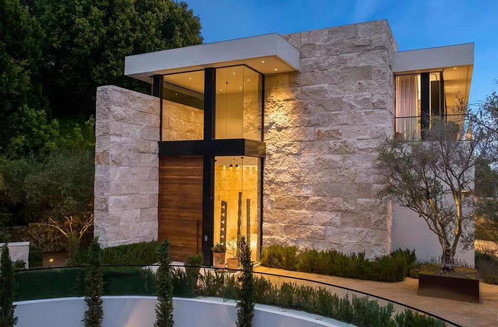 The Bel Air Mansion is a recently completed 15,000 sf contemporary masterpiece with soaring ceilings throughout, state-of-the-art amenities now available for sale. This home located at 755 Sarbonne Rd, Los Angeles, California