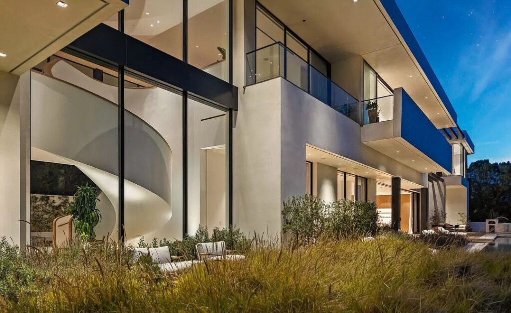 The Bel Air Mansion is a recently completed 15,000 sf contemporary masterpiece with soaring ceilings throughout, state-of-the-art amenities now available for sale. This home located at 755 Sarbonne Rd, Los Angeles, California