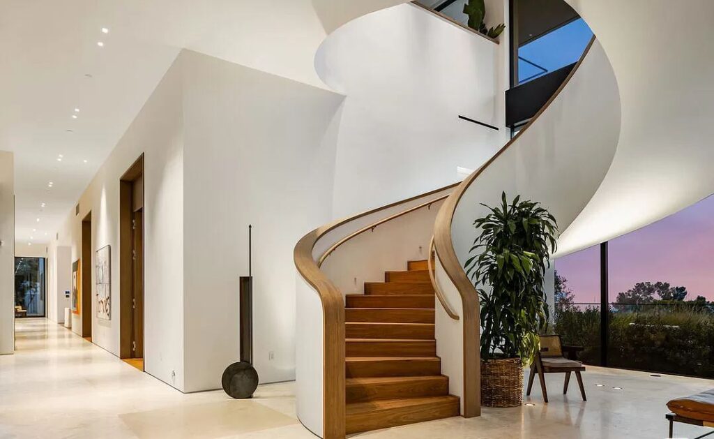 The Bel Air Mansion is a recently completed 15,000 sf contemporary masterpiece with soaring ceilings throughout, state-of-the-art amenities now available for sale. This home located at 755 Sarbonne Rd, Los Angeles, California