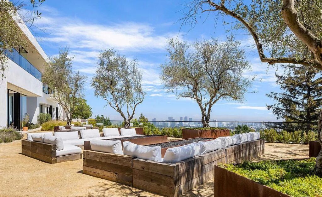 The Bel Air Mansion is a recently completed 15,000 sf contemporary masterpiece with soaring ceilings throughout, state-of-the-art amenities now available for sale. This home located at 755 Sarbonne Rd, Los Angeles, California