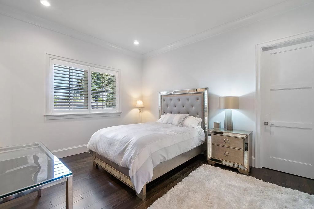 The Home in Boca Raton is a pristinely maintained transitional estate with island-inspired architectural accents now available for sale. This home located at 2155 W Silver Palm Rd, Boca Raton, Florida