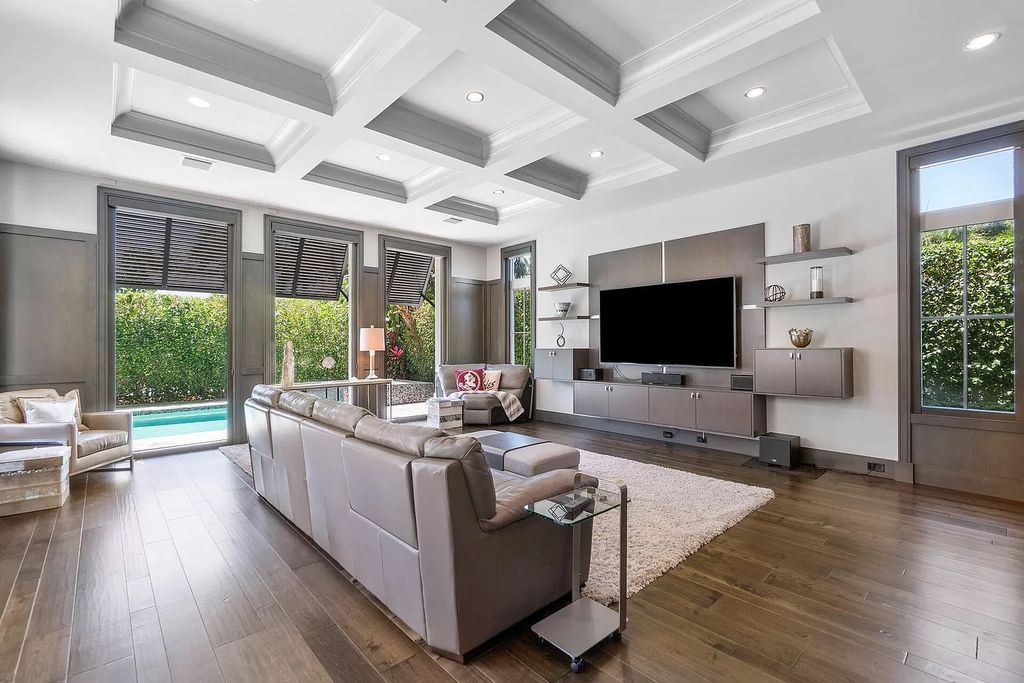 The Home in Boca Raton is a pristinely maintained transitional estate with island-inspired architectural accents now available for sale. This home located at 2155 W Silver Palm Rd, Boca Raton, Florida