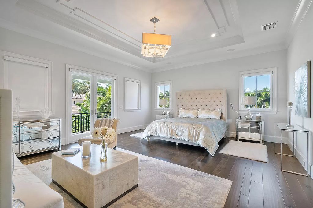 The Home in Boca Raton is a pristinely maintained transitional estate with island-inspired architectural accents now available for sale. This home located at 2155 W Silver Palm Rd, Boca Raton, Florida