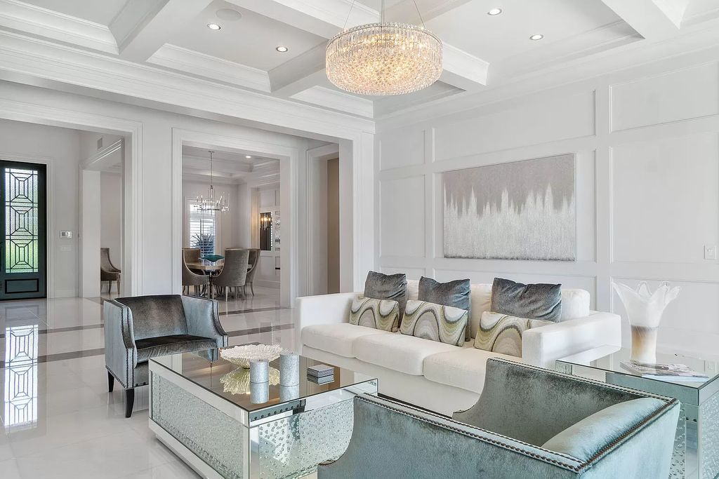 The Home in Boca Raton is a pristinely maintained transitional estate with island-inspired architectural accents now available for sale. This home located at 2155 W Silver Palm Rd, Boca Raton, Florida