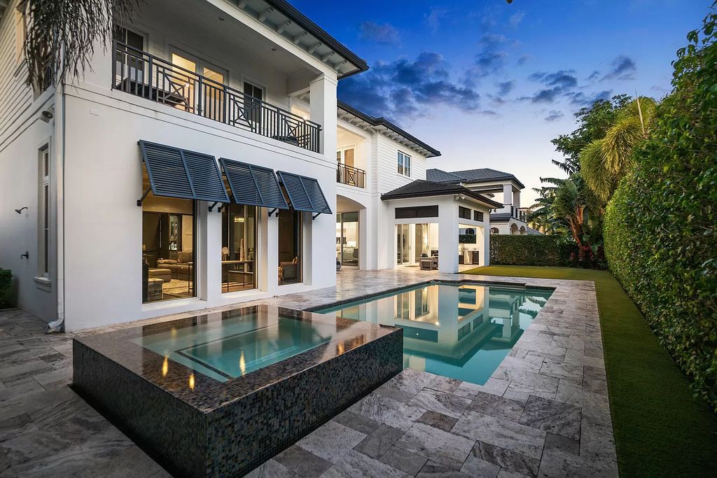 The Home in Boca Raton is a pristinely maintained transitional estate with island-inspired architectural accents now available for sale. This home located at 2155 W Silver Palm Rd, Boca Raton, Florida
