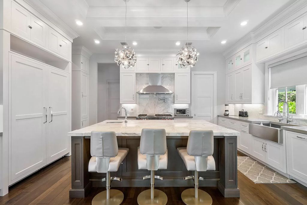 The Home in Boca Raton is a pristinely maintained transitional estate with island-inspired architectural accents now available for sale. This home located at 2155 W Silver Palm Rd, Boca Raton, Florida