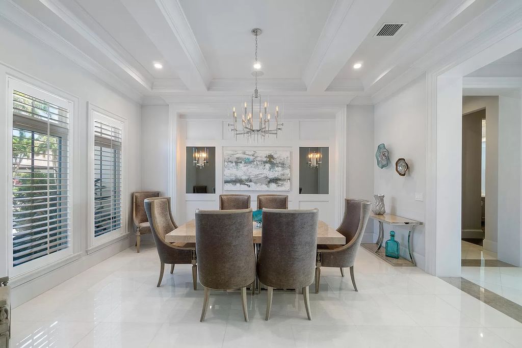 The Home in Boca Raton is a pristinely maintained transitional estate with island-inspired architectural accents now available for sale. This home located at 2155 W Silver Palm Rd, Boca Raton, Florida