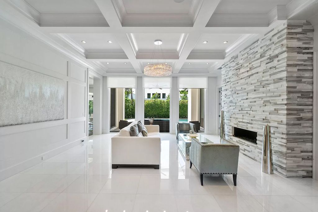 The Home in Boca Raton is a pristinely maintained transitional estate with island-inspired architectural accents now available for sale. This home located at 2155 W Silver Palm Rd, Boca Raton, Florida
