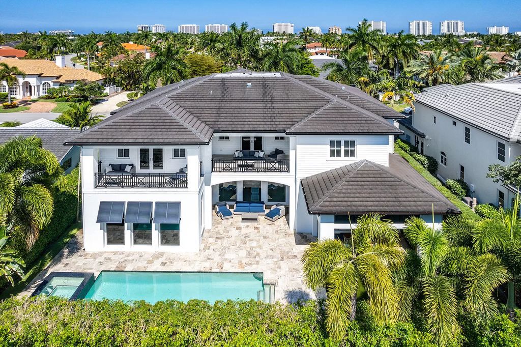 The Home in Boca Raton is a pristinely maintained transitional estate with island-inspired architectural accents now available for sale. This home located at 2155 W Silver Palm Rd, Boca Raton, Florida