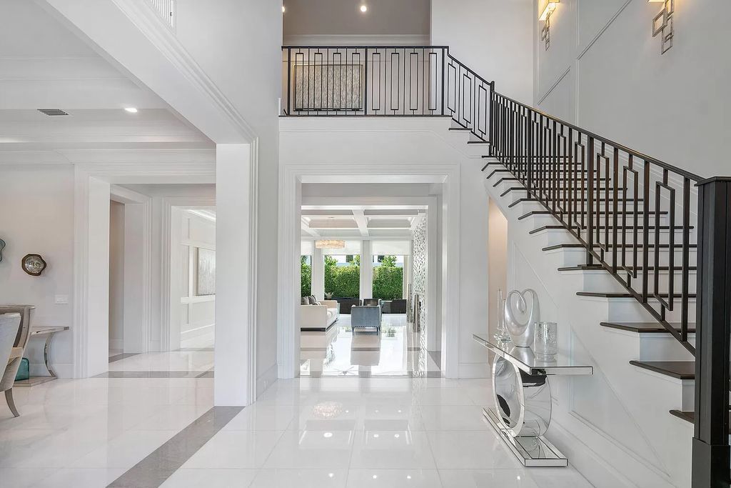 The Home in Boca Raton is a pristinely maintained transitional estate with island-inspired architectural accents now available for sale. This home located at 2155 W Silver Palm Rd, Boca Raton, Florida