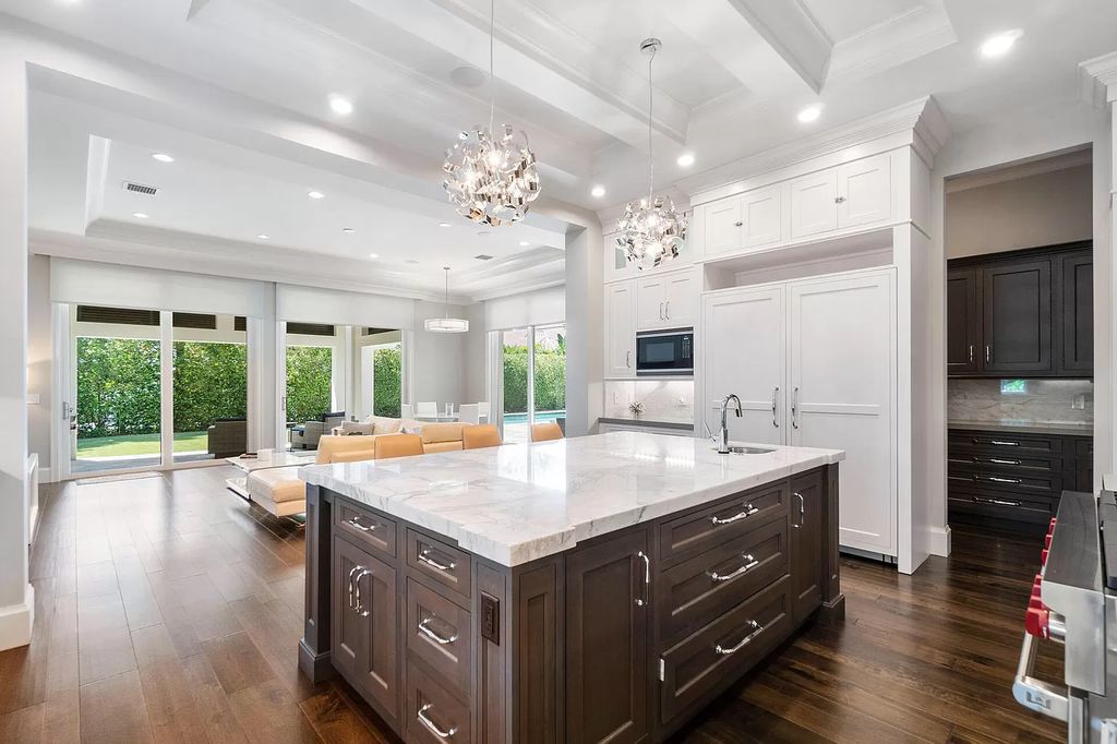 The Home in Boca Raton is a pristinely maintained transitional estate with island-inspired architectural accents now available for sale. This home located at 2155 W Silver Palm Rd, Boca Raton, Florida