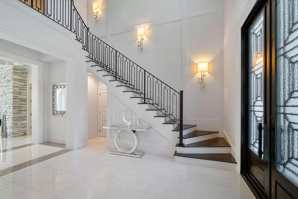 The Home in Boca Raton is a pristinely maintained transitional estate with island-inspired architectural accents now available for sale. This home located at 2155 W Silver Palm Rd, Boca Raton, Florida