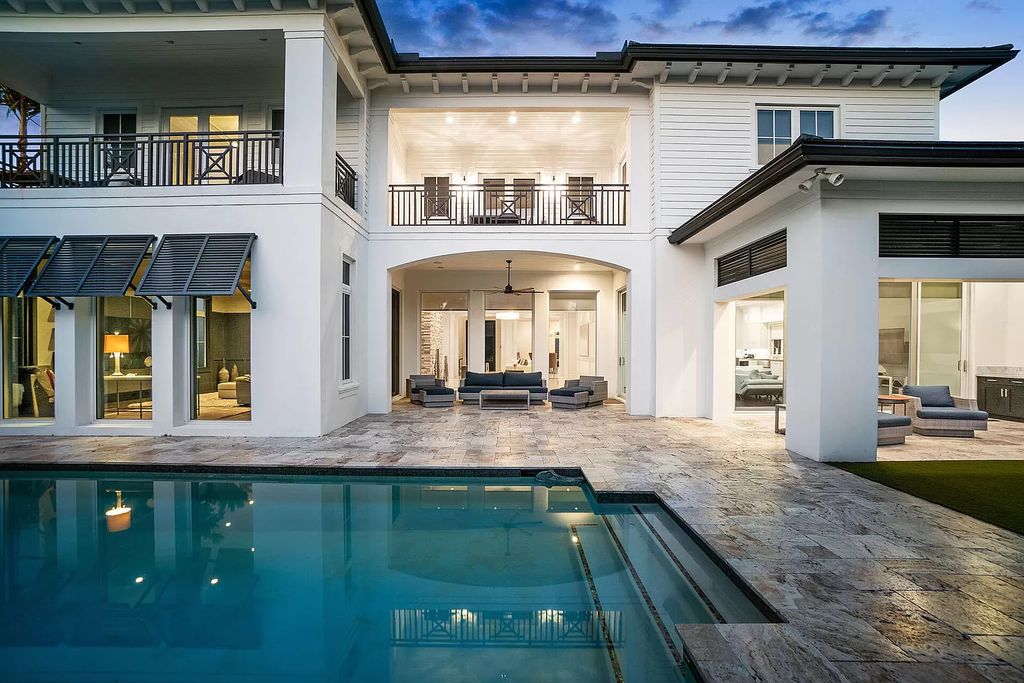 The Home in Boca Raton is a pristinely maintained transitional estate with island-inspired architectural accents now available for sale. This home located at 2155 W Silver Palm Rd, Boca Raton, Florida