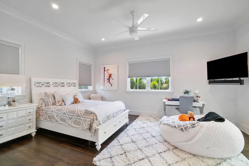 The Home in Boca Raton is a pristinely maintained transitional estate with island-inspired architectural accents now available for sale. This home located at 2155 W Silver Palm Rd, Boca Raton, Florida