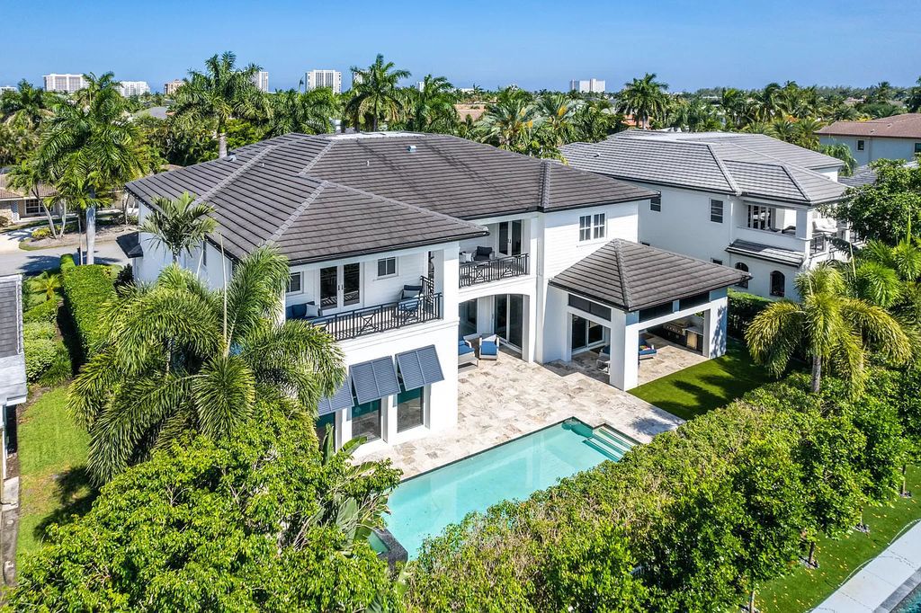 The Home in Boca Raton is a pristinely maintained transitional estate with island-inspired architectural accents now available for sale. This home located at 2155 W Silver Palm Rd, Boca Raton, Florida