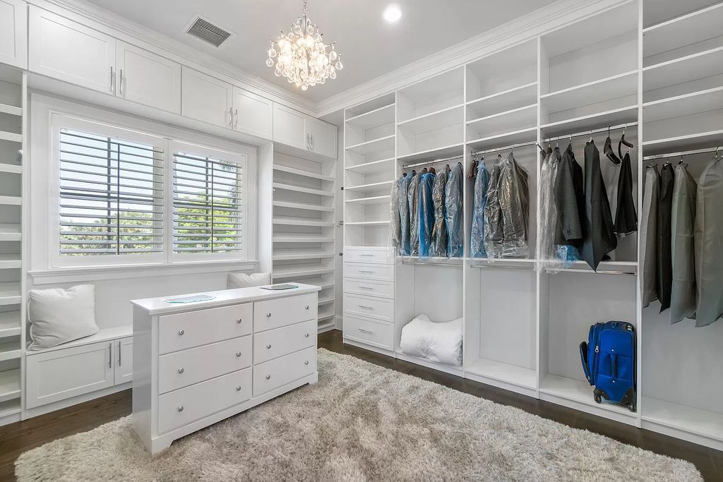 The Home in Boca Raton is a pristinely maintained transitional estate with island-inspired architectural accents now available for sale. This home located at 2155 W Silver Palm Rd, Boca Raton, Florida