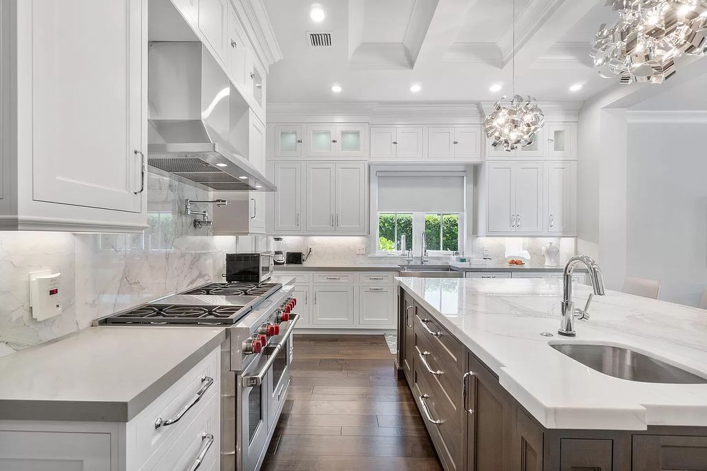 The Home in Boca Raton is a pristinely maintained transitional estate with island-inspired architectural accents now available for sale. This home located at 2155 W Silver Palm Rd, Boca Raton, Florida