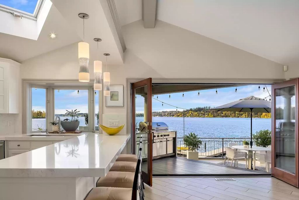 The Estate in Washington is a luxurious home highly curated landscape with an easy effort to the lake now available for sale. This home located at 8900 N Mercer Way, Mercer Island, Washington; offering 04 bedrooms and 05 bathrooms with 5,953 square feet of living spaces. 