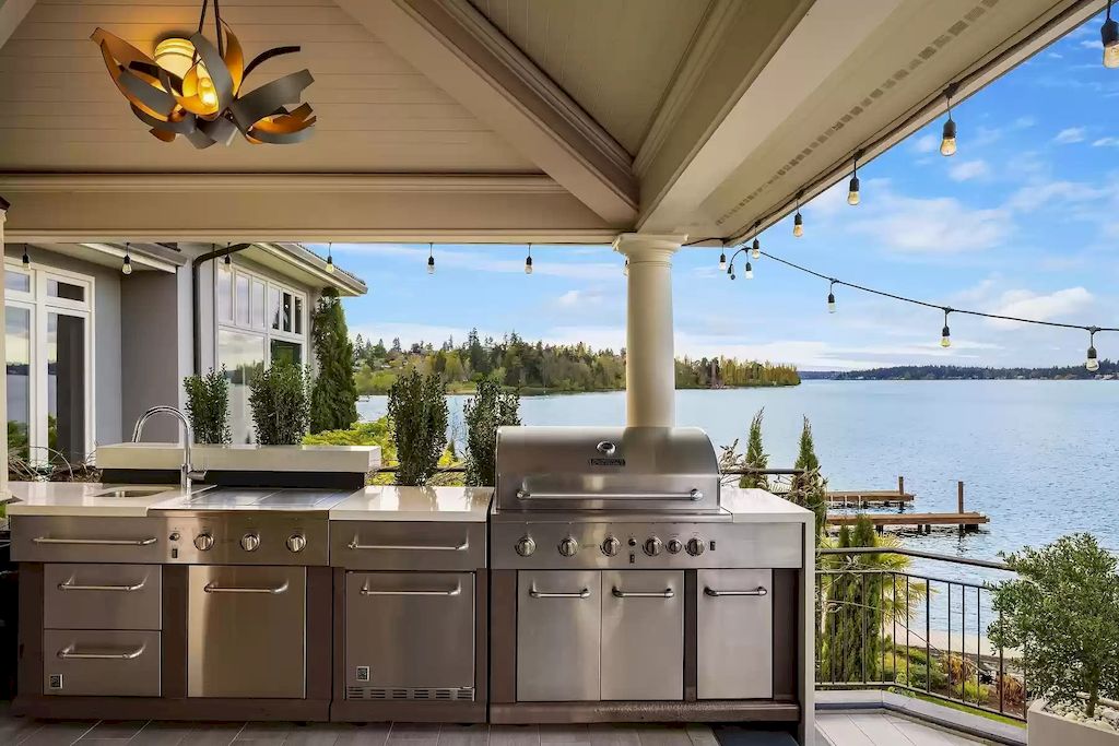 The Estate in Washington is a luxurious home highly curated landscape with an easy effort to the lake now available for sale. This home located at 8900 N Mercer Way, Mercer Island, Washington; offering 04 bedrooms and 05 bathrooms with 5,953 square feet of living spaces. 