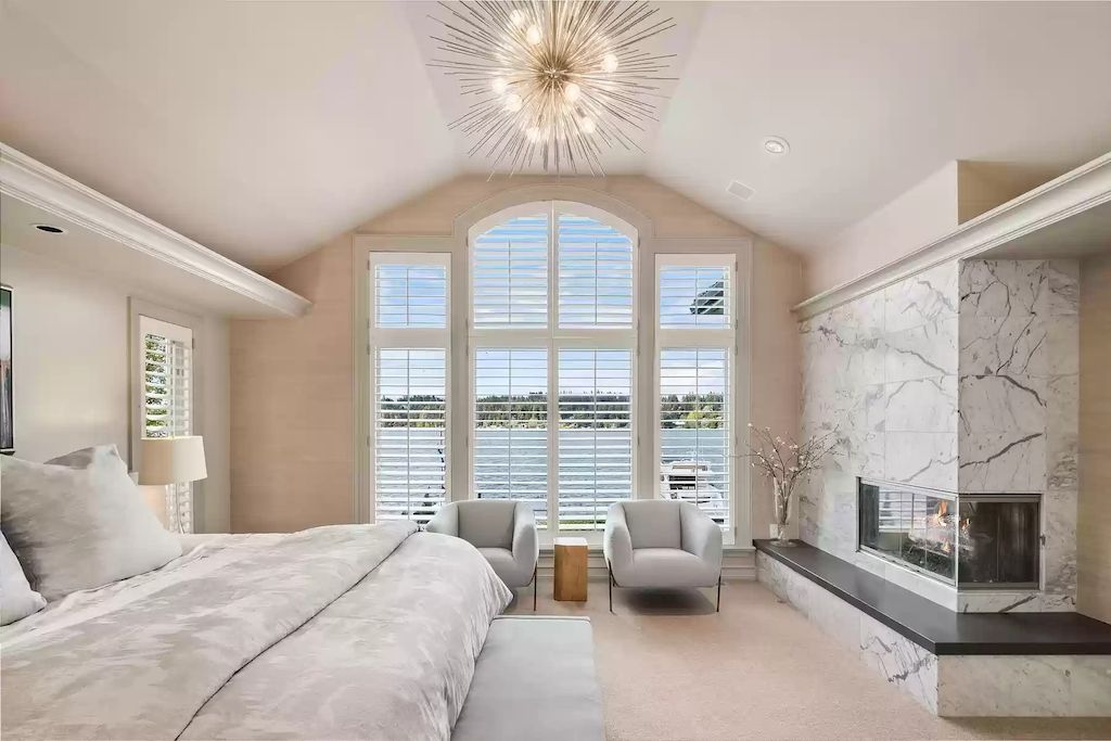 The Estate in Washington is a luxurious home highly curated landscape with an easy effort to the lake now available for sale. This home located at 8900 N Mercer Way, Mercer Island, Washington; offering 04 bedrooms and 05 bathrooms with 5,953 square feet of living spaces. 