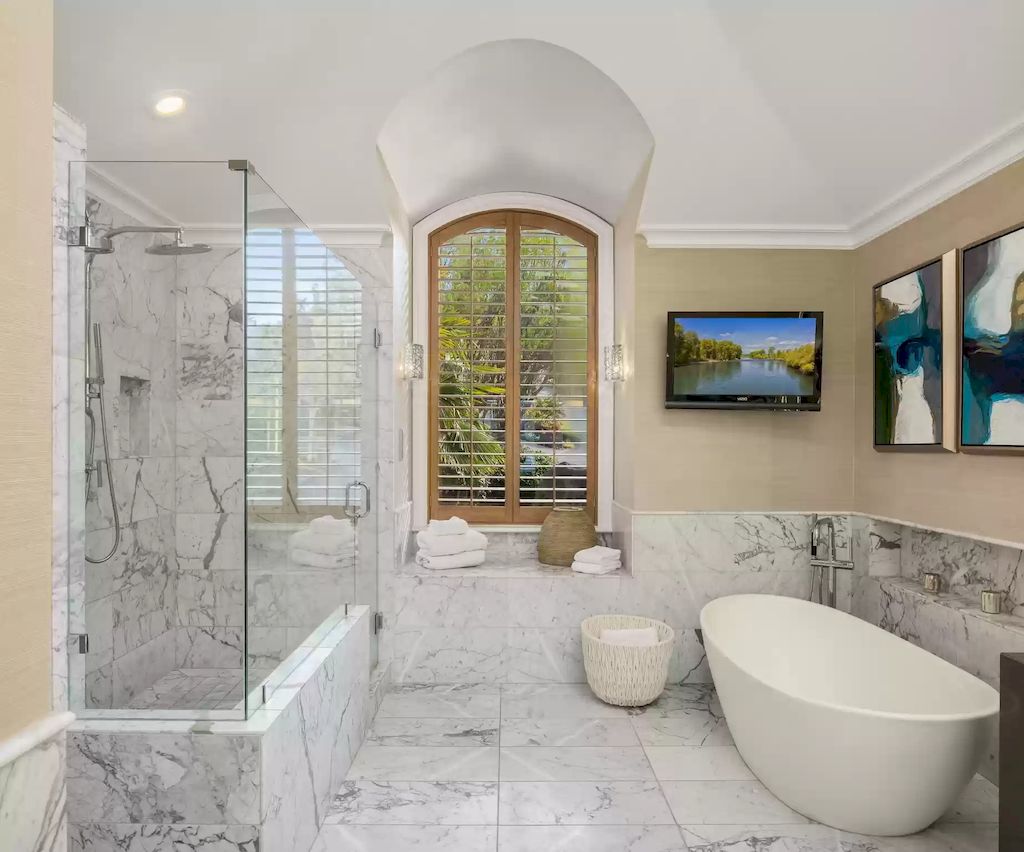 The Estate in Washington is a luxurious home highly curated landscape with an easy effort to the lake now available for sale. This home located at 8900 N Mercer Way, Mercer Island, Washington; offering 04 bedrooms and 05 bathrooms with 5,953 square feet of living spaces. 