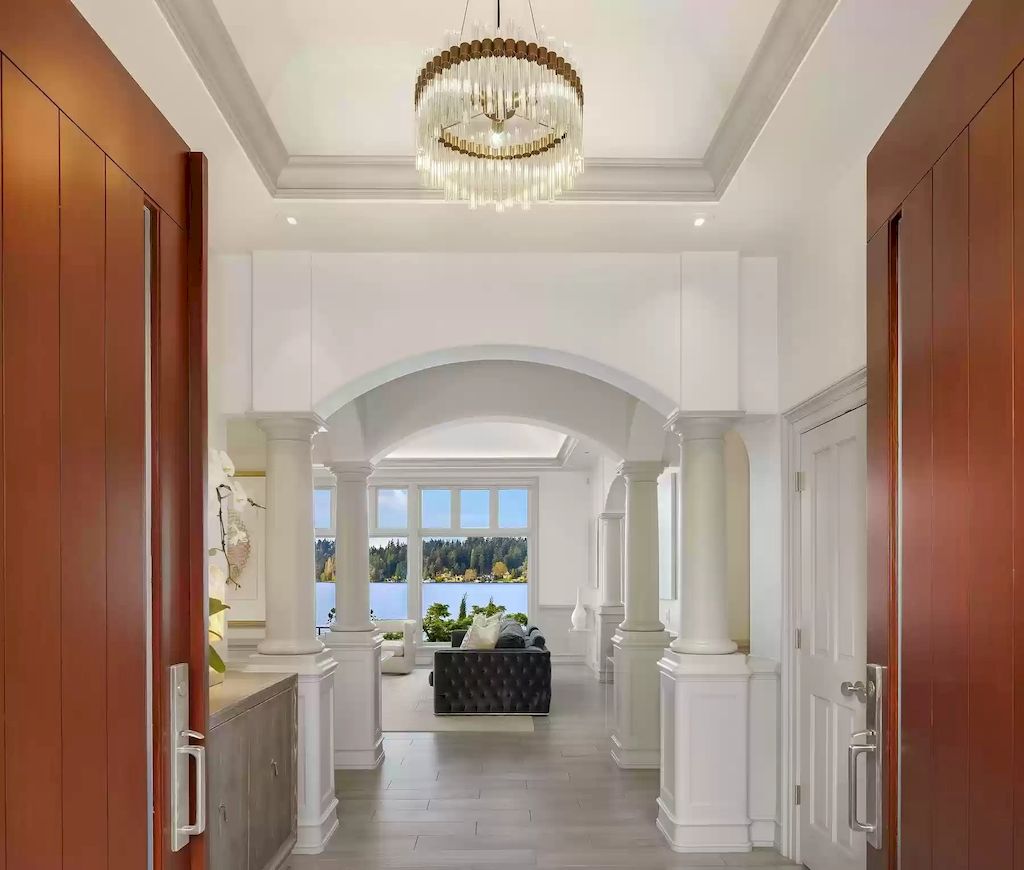 The Estate in Washington is a luxurious home highly curated landscape with an easy effort to the lake now available for sale. This home located at 8900 N Mercer Way, Mercer Island, Washington; offering 04 bedrooms and 05 bathrooms with 5,953 square feet of living spaces. 