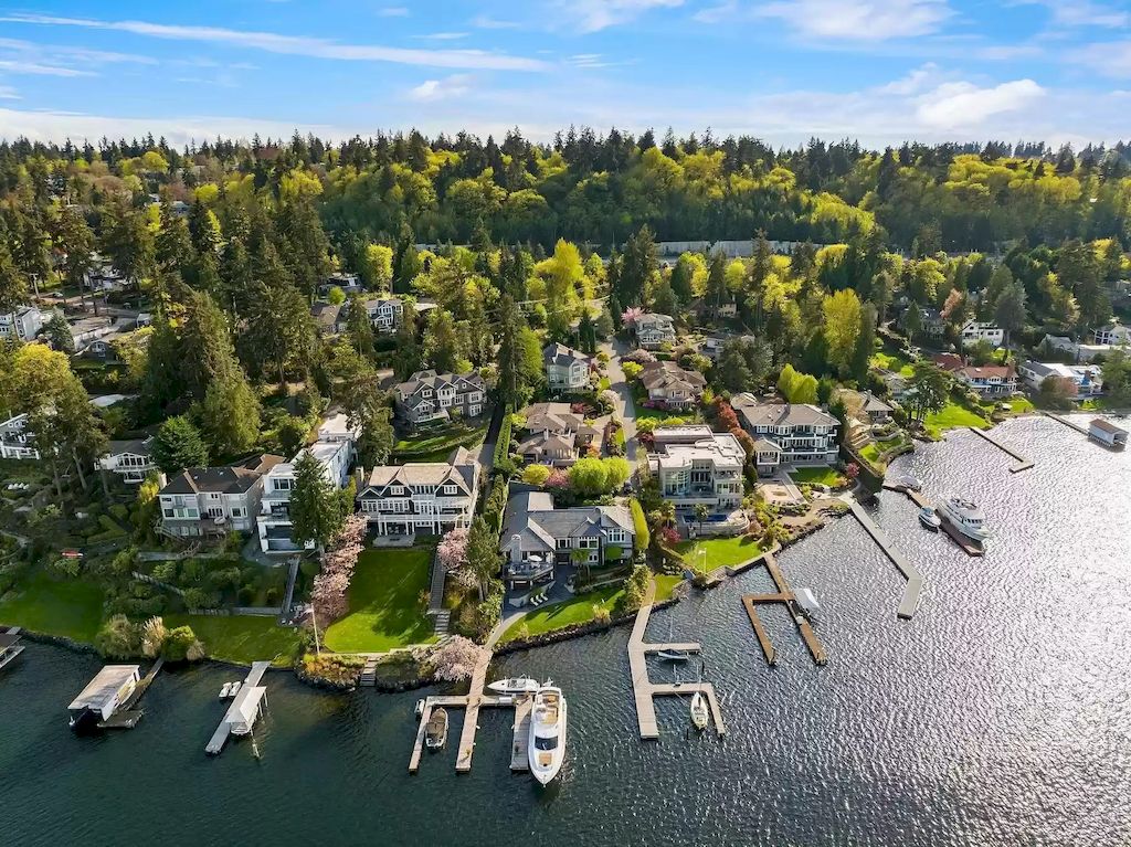 The Estate in Washington is a luxurious home highly curated landscape with an easy effort to the lake now available for sale. This home located at 8900 N Mercer Way, Mercer Island, Washington; offering 04 bedrooms and 05 bathrooms with 5,953 square feet of living spaces. 