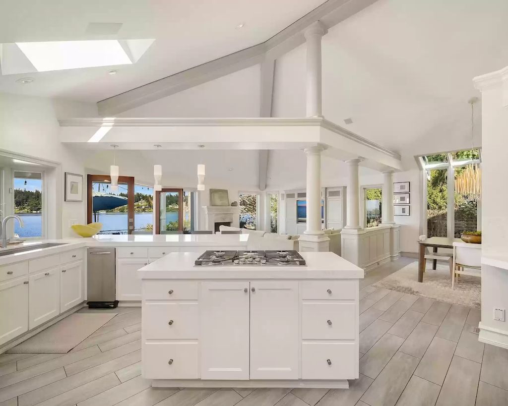 The Estate in Washington is a luxurious home highly curated landscape with an easy effort to the lake now available for sale. This home located at 8900 N Mercer Way, Mercer Island, Washington; offering 04 bedrooms and 05 bathrooms with 5,953 square feet of living spaces. 