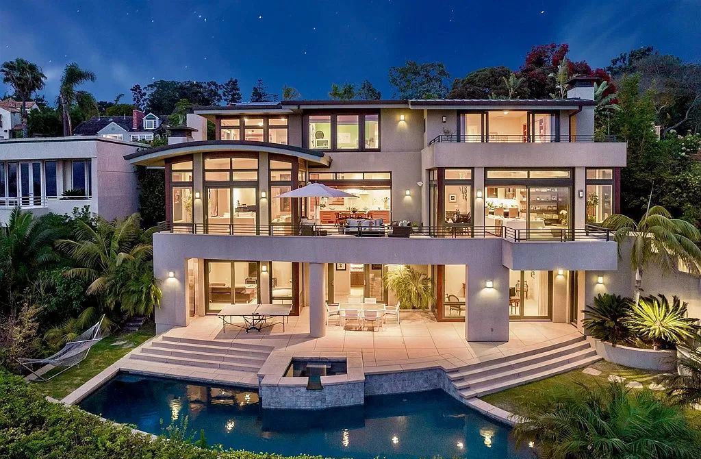 The Home in La Jolla is a classic contemporary estate has sweeping panoramic views of both the ocean and La Jolla Country Club Golf Course now available for sale. This house located at 6848 Country Club Dr, La Jolla, California