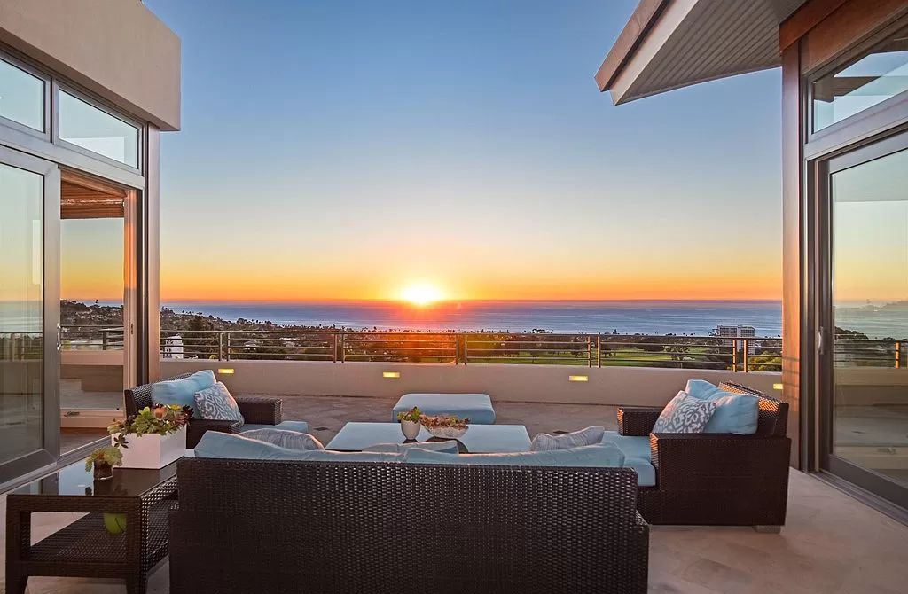 The Home in La Jolla is a classic contemporary estate has sweeping panoramic views of both the ocean and La Jolla Country Club Golf Course now available for sale. This house located at 6848 Country Club Dr, La Jolla, California